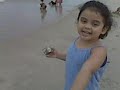 Little Girl and Sand Castle