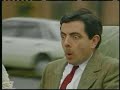 Mr. Bean Video - Mr. Bean driving on roof of a car
