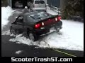 How not to pull a car out of the snow.