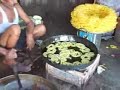 Jalebi is a sweet widely available in India. Towards South India its called jilebi. The video has a local baker in Rajkot, Gujarat making jalebis in not-so-clean environment.Music: Anand Milind, QSQT