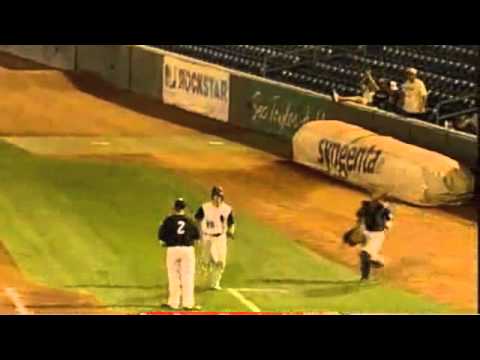 alex burnett - Alex Burnett, second baseman of Bishop Heelan, and Northwestern recruit, makes a sliding barehanded play to nip a runner at first in the Iowa High School Bas...