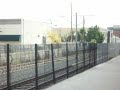 metro gold line breda rolling into fillmore station with combination of high horn and low gong.MOV