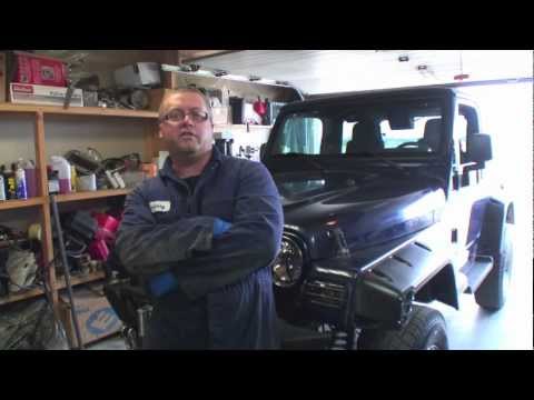 how to drain transmission fluid without dropping the pan