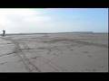LANDBOARDING AND KITESURFING...KITE LANDBOARD SURF BEACH KITESURFING