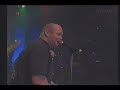maukka heiluu moottorisahan kanssa pop-finlandia konsertissa vuonna 2000.