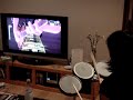 Thien-Lan playing RHCP on Rock Band drums