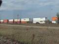 2 BNSF Trains Pass Us On A Speeder