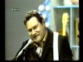 one of the giant of real country music in a rare television show i guess in 1970