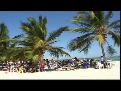 Playa Boca Chica Beach - A typical weekend day on Playa Boca Chica Beach in the Dominican Republic. Just 45 minutes from the capital of Santo Domingo, tourists and locals alike head ...