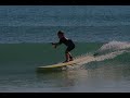 little boy rocks the longboard at noosa