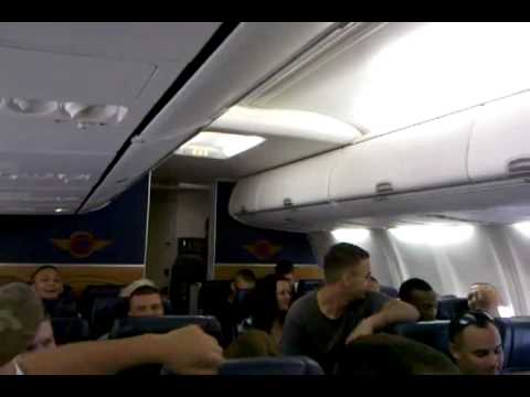 Marine Sings to his Fellow Soldiers on Plane Trip Home