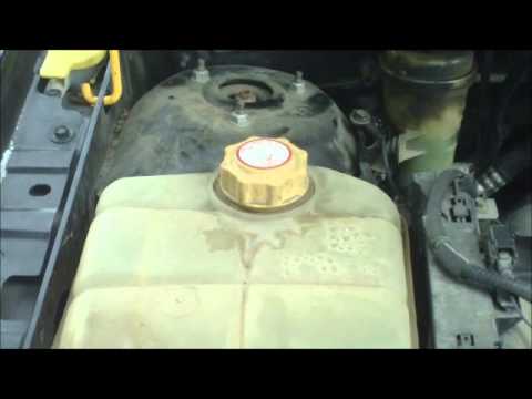 how to drain ford focus radiator