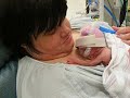 Claire holding Erik