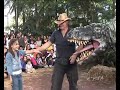 T-rex dinosaur bites girl