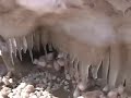 Icy day along the coast of Lake Michigan in Ludington, Michigan. Augie and Ruby explore ice formations and caves.