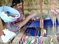 Rosa Marina Mux and her daughter weaving on a foot loom