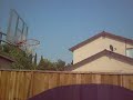 5 foot one kid does alley oop dunk on ten foot hoop