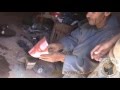1/7. Latero del zoco de Ifoulou / Ifoulou's Souk Tinsmith