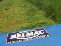 MF135 cutting long grass with topping mower