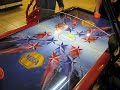 demonstration of an incredible air hockey table... this one respects no law, especially not descartes' one, causing reflections on its edges totally non-sense. actually, i guess it's the ufo level in shuffle puck caf�. no doubt about it.