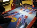 demonstration of an incredible air hockey table... this one respects no law, especially not descartes' one, causing reflections on its edges totally non-sense. actually, i guess it's the ufo level in shuffle puck caf�. no doubt about it.