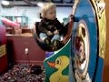 Jayden Riding a ride at Billy Bobs 2/17/2012