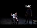 hugh jackman and daniel craig show some classy off-script acting while facing an immensely irritating cell phone ringing from the audience during a nyc performance of 