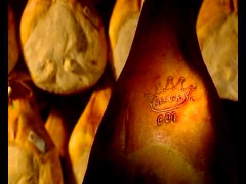 Parmaschinken - Wir öffnen die Pforte zum Schinkenhimmel! Da hängen sie über uns, neben uns, hinter uns: Tausende von appetitlichen Schweinekeulen. Und es duftet nach Honig,...