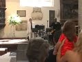 katie iver sings, accompanied by wayne mcgregor on guitar.  the venue is the wedding of richard neish and heather christie in st helen's church, bishopsgate, london on 2nd june 2007