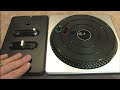 Classic Game Room HD reviews the DJ HERO TURNTABLE CONTROLLER for the DJ Hero video game. This is the Xbox 360 version, DJ Hero is also available for Playstation 3 PS3 and Nintendo Wii. Cut up some mad tracks on the wheels of plastic with this unique and clever controller with a record platter, fader and buttons. How do you play DJ Hero with the turntable controller you may ask? Easy!! By playing DJ Hero with the turntable controller. Watch CGR explain what makes the DJ Hero Turntable ...