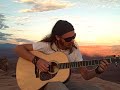 l'ispirazione musicale in canyonland national park, utah, stati uniti.
e' stato gratificante e coinvolgente suonare la mia larry (larrivee la stessa marca usata da raul midon) in uno scenario cos� suggestivo.
il deserto rosso, il panorama mozzafiato incorniciati da un cielo surreale.

notions:

raul midon plays the l-05 with the cutaway (lv-05) or c-09 flat-top sports an onboard b-band a6 preamp and dual-pickup system.
my guitar is a model l-03re!

raul mid�n (born march 14, 1966) is an american singer-songwriter and guitarist from new mexico, based in new york city. he combines his distinct voice, strumming, beats, and a cappella sounds to create a one-man performance. his unique style shows influence of virtually every musical genre which came before him, including jazz, blues, r&b, and folk.

canyonlands national park is located in the american state of utah, near city of moab and preserves a colorful landscape eroded into countless canyons, mesas and buttes by the colorado river and its tributaries. the rivers divide the park into four districts: the island in the sky, the needles, the maze and the rivers themselves. while these areas share a primitive desert atmosphere, each retains its own character.[1] the park covers 527.5 mi� (1,366 km�). canyons are carved into the colorado plateau by the colorado river and green river.

a subsiding basin and nearby uplifting mountain range (the uncompahgre) existed in the area in pennsylvanian time. seawater trapped in the subsiding basin created thick evaporite deposits by mid pennsylvanian. this, along with eroded material from the nearby mountain range, become the paradox formation, itself a part of the hermosa group. paradox salt beds started to flow later in the pennsylvanian and probably continued to move until the end of the jurassic.[8] some scientists believe upheaval dome was created from paradox salt bed movement, creating a salt dome, but more modern studies show that the meteorite theory is more likely to be correct.

a warm shallow sea again flooded the region near the end of the pennsylvanian. fossil-rich limestones, sandstones, and shales of the gray-colored honaker trail formation resulted. a period of erosion then ensued, creating a break in the geologic record called an unconformity. early in the permian an advancing sea laid down the halgaito shale. coastal lowlands later returned to the area, forming the elephant canyon formation.

large alluvial fans filled the basin where it met the uncompahgre mountains, creating the cutler red beds of iron-rich arkose sandstone. underwater sand bars and sand dunes on the coast inter-fingered with the red beds and later became the white-colored cliff-forming cedar mesa sandstone. brightly-colored oxidized muds were then deposited, forming the organ rock shale. coastal sand dunes and marine sand bars once again became dominate, creating the white rim sandstone.

a second unconformity was created after the permian sea retreated. flood plains on an expansive lowland covered the eroded surface and mud built up in tidal flats, creating the moenkopi formation. erosion returned, forming a third unconformity. the chinle formation was then laid down on top of this eroded surface.

increasingly dry climates dominated the triassic. therefore, sand in the form of sand dunes invaded and became the wingate sandstone. for a time climatic conditions became wetter and streams cut channels through the sand dunes, forming the kayenta formation. arid conditions returned to the region with a vengeance; a large desert spread over much of western north america and later became the navajo sandstone. a fourth unconformity was created by a period of erosion.

mud flats returned, forming the carmel formation and the entrada sandstone was laid down next. a long period of erosion stripped away most of the san rafael group in the area along with any formations that may have been laid down in the cretaceous period.

the laramide orogeny started to uplift the rocky mountains 70 million years ago and with it the canyonlands region. erosion intensified and when the colorado river canyon reached the salt beds of the paradox formation the overlying strata extended toward the river canyon, forming features such as the grabens. increased precipitation during the ice ages of the pleistocene quickened the rate of canyon excavation along with other erosion. similar types of erosion are ongoing, but occur at a slower rate.

emiliano martino
hilary thavis
gaia groove