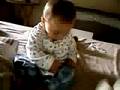 Toddler playing Sax