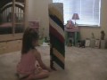 Alicia destroys another bottle cap tower