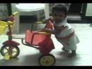 Cheryl walking pushing her tricylce