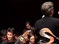 this is part two of benjamin verdery's guitar orchestra piece scenes from ellis island.  it was performed in parry sound, ontario at the festival of sound on july 24th, 2007.  make sure you watch the encore....it's worth it!
