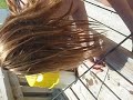 Squeemish girl trying to bait hook while on vacation in Port Aransas Squeemish girl trying to bait hook while on vacation in Port Aransas