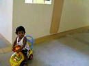 Jayden Ratnam playing along the corridor Jayden Ratnam playing along the corridor