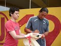 firma de camiseta