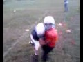 Peyton - more 6 year old football player hitting