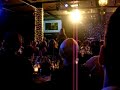 this is lucy working the floor during the auction and letting the auctioneer know when someone had made a bid. it was quite dark and there were several people helping throughout the room.