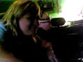 laura trys to get candy corn in her mouth?