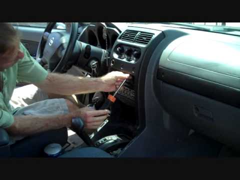 how to remove a cd player from a nissan xterra