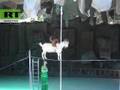 monkey on a goat on a cup on a tight rope