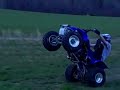 Myself doing wheelies on my 2001 Yamaha Warrior and my buddies 2005 Raptor 350.