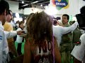 En una accion de la asamblea ambiental de Gualeguaychú, Gisella irrumpe en la Feria Internacional de Turismo (FIT) con su cuerpo pintado con el FUERA BOTNIA, NO A LAS PAPELERAS; GUALEGUAYCHU.