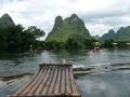 Bamboo rafting on Yulong River in Guanxi Province, China