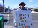 ray sharing his faith on caldwell corner of cleavland and 10