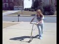 Megan riding broken scooter