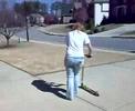 Megan riding broken scooter