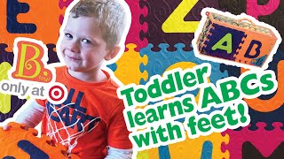 Toddler learns ABCs with his feet | B. Toys Alphabet Floor Puzzle